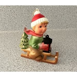 Vintage Kurt Adler Hard Plastic Christmas Ornament Sled Lantern Boy Toboggan Hat